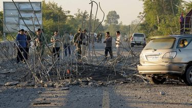 People look at a damaged bridge after Thailand carried out air strikes in an area between Cambodia's Oddar Meanchey and Siem Reap provinces on December 20, 2025. The United States hopes a renewed ceasefire will be reached by early next week to end clashes between Thai and Cambodian forces, Secretary of State Marco Rubio said on December 19.
STR / AFP
