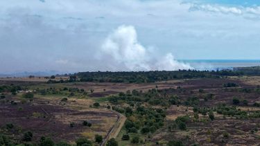 An aerial photo shows smoke over the site of a wildfire at Dunwich Heath in eastern England on July 30, 2026. Firefighters in eastern England were Thursday battling a 
