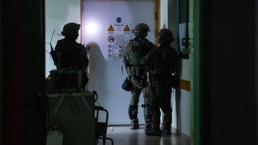 2023-11-15 15:32:20 This handout picture released by the Israeli army on November 15, 2023, reportedly shows Israeli soldiers carrying out operations inside Al-Shifa hospital in Gaza City, amid continuing battles betweeen Israel and the Palestinian militant group Hamas. 
Israeli Army / AFP