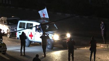2023-11-25 22:38:31 This image grab taken from AFPTV video footage on November 25, 2023 shows an International Red Cross vehicle reportedly carrying hostages released by Hamas driving towards the Rafah border point with Egypt ahead of their transfer to Israel. A group of 13 Israeli and four Thai hostages released by Hamas crossed into Egypt late Saturday, Egyptian state-linked television reported.
Belal Al SABBAGH / AFPTV / AFP