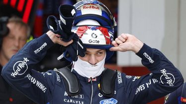 Red Bull Racing's Dutch driver Max Verstappen takes off his helmet in the pits during the qualifying session ahead of the Formula One Japanese Grand Prix at the Suzuka circuit in Suzuka, Mie prefecture on March 28, 2026. 
FRANCK ROBICHON / POOL / AFP