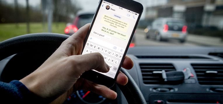 appen achter het stuur smartphone