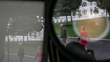 Journalists walk past broadcast news workspaces outside the White House in Washington, DC, on September 23, 2026.  A US federal judge is holding a hearing on Wednesday to consider a demand by CNN, MS NOW and Politico to have their White House access restored after their credentials were revoked by President Donald Trump. The three media outlets went to court after Trump on Friday ordered that they be barred as punishment for distributing what he called 
