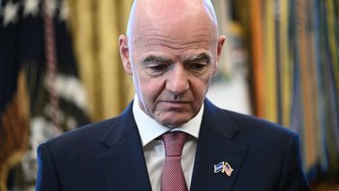 (FILES) FIFA president Gianni Infantino looks on during a meeting with the White House Task Force on the FIFA World Cup 2026 in the Oval Office of the White House in Washington, DC on November 17, 2025. FIFA president Gianni Infantino has lost the 