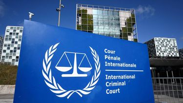 This general view shows the exterior and the logo of the International Criminal Court (ICC) in The Hague on March 28, 2026.  JOHN THYS / AFP