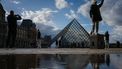 Guest Tourists pose for a photo in front of the Pyramide du Louvre, designed by Chinese-US architect Ieoh Ming Pei, with the Louvre Museum in the background in Paris on October 23, 2025.  The Louvre Museum reopened its doors to visitors in the morning of October 22, 2025 for the first time since the spectacular robbery on October 19, 2025 by four criminals, who made off with eight jewels worth an estimated €88 million.
Dimitar DILKOFF / AFP