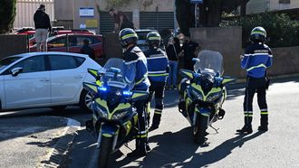 French gendarmes stand in front of Joseph-Lakanal high school after a headmaster was injured by a hunting rifle shot and a teenager was arrested in Aubagne, southern France, on October 12, 2026. The school head was hit by a 12-gauge hunting rifle shot, a source specified, adding that a member of the teaching staff was also hit. The victim's life is not in danger.
Miguel MEDINA / AFP