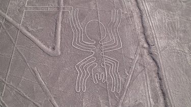 Image of gigantic geoglyphs, known as the Nazca lines, built by people belonging to the Nazca culture, around 1600 years ago in Nazca, southern Peru on May 17, 2023. The famous Nazca Lines, recognized as a World Heritage Site by UNESCO, are geoglyphs more than 2,000 years old with geometric and animal figures that can only be seen from the sky.
Ernesto BENAVIDES / AFP