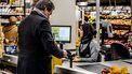 Supermarkten schermen kassa's af met plexiglas