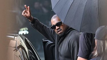 US rapper and producer Kanye West gestures upon arriving at Shanghai Pudong International Airport on July 11, 2025.  Kanye West will hold a concert in Shanghai on July 12.
Hector RETAMAL / AFP