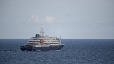 The hantavirus-stricken cruise ship MV Hondius leaves the port of Granadilla de Abona on the island of Tenerife in Spain's Canary Islands on May 11, 2026. Adverse weather conditions forced the cruise ship MV Hondius hit by a deadly hantavirus outbreak and anchored off Spain's Canary Islands to dock at Tenerife on May 11, 2026 before evacuations can be completed, the health ministry said.
JORGE GUERRERO / AFP