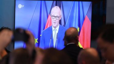 CDU members watch German Chancellor and leader of Germany's Christian Democratic Union (CDU) Friedrich Merz delivering a statement after the exit polls of regional state elections in Berlin and  Mecklenburg-Western-Pomerania's in Berlin on September 20, 2026.
  
Odd ANDERSEN / AFP
