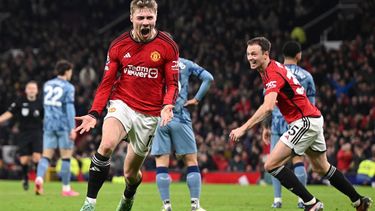 Manchester United's Danish striker #11 Rasmus Hojlund (C) celebrates after scoring their third goal during the English Premier League football match between Manchester United and Aston Villa at Old Trafford in Manchester, north west England, on December 26, 2023. 
Oli SCARFF / AFP