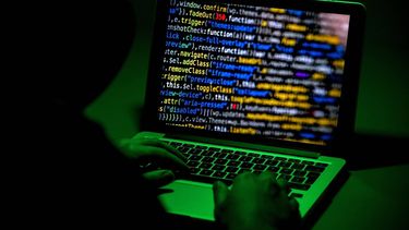 epa07544072 (FILE) - ILLUSTRATION - A person sits in front of a computer screen in Moers, Germany, 04 January 2019 (reissued 03 May 2019). According to media reports German and US investigators have jointly succeeded in striking a blow against illegal Internet marketplace The Wallstreet Market site, which was considered the second largest Darknet forum for drugs, hijacked credit cards and forged identity papers. The operators were primarily targeting the US market. They are in custody in Germany.  EPA/SASCHA STEINBACH