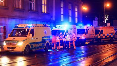 epa11040006 Members of the emergency service at the scene of a shooting at Charles University in central Prague, 21 December 2023. According to Czech Police several people have been killed and 