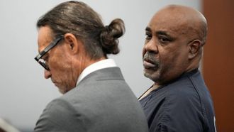 Duane Davis (R) stands with his attorney Michael Sanft during his sentencing hearing in the 1996 killing of rapper Tupac Shakur, at Clark County District Court at the Regional Justice Center in Las Vegas, Nevada, on October 13, 2026. Davis, a former Los Angeles gang member, will be sentenced today after being found guilty on August 31, 2026 by a Las Vegas court, thirty years after the rap legend's death in Las Vegas.
John Locher / POOL / AFP