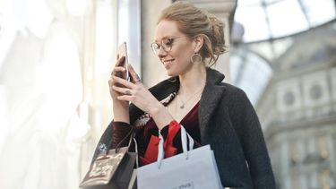shoppen geluk gelukkig
