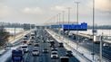 HOOFDDORP - Verkeer op de A4. Op verschillende snelwegen zorgt het winterweer en de gladheid voor ongelukken en vertraging. ROBIN UTRECHT / ANP
