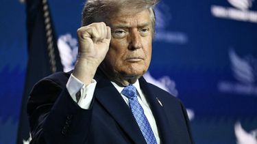 US President Donald Trump pumps his fist after speaking at the Faith & Freedom Coalition's 2026 Policy Conference at the Washington Hilton in Washington, DC, on June 26, 2026.  
Kent NISHIMURA / AFP