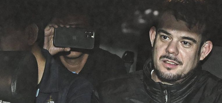 Dutch Joran Van der Sloot is transferred in a police car from the Ancon I jail in Lima, on June 08, 2023.
 Joran Van der Sloot, jailed in Peru for murder will be handed over to face charges in the United States related to the 2005 disappearance of an American woman in Aruba. The ruling marks a turnaround from the South American country's decision in 2012, when it said it would only send Dutch national Joran Van der Sloot to the United States in 2038 once he had completed a 28-year prison sentence for murdering a Peruvian woman.

Ernesto BENAVIDES / AFP