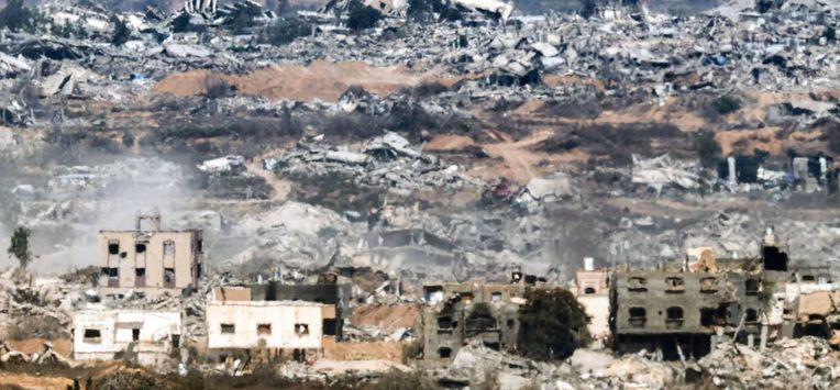 Destroyed buildings are pictured in the Gaza Strip as seen from a position along the border in southern Israel on July 29, 2025. 
Jack GUEZ / AFP