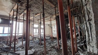 This undated handout photo released by the Office of Hong Kong's Deputy Chief Secretary for Administration on April 20, 2026, shows the aftermath of a fire, which killed 168, inside an apartment block at the Wang Fuk Court residential estate in Hong Kong. Thousands of Hong Kong residents who lost their homes in a massive fire last year are set to return from April 20, 2026 for the first time to collect what is left of their belongings.
Handout / Office of Hong Kong's Deputy Chief Secretary for Administration / AFP