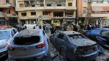 People gather at the scene of an Israeli strike that targeted Beirut's southern suburbs a day earlier, as search and rescue operations continue on September 21, 2024. Lebanon's Hezbollah said on September 21 that a second senior commander was among 16 fighters killed in an Israeli air strike on its Beirut stronghold the previous day, highlighting the scale of the blow to its military leadership.
AFP
