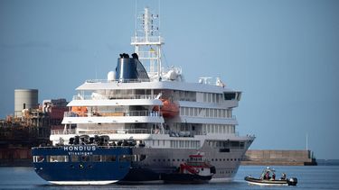 Boats approach the Dutch flagged hantavirus-stricken cruise ship MV Hondius after it arrived at the industrial port of Granadilla de Abona on the island of Tenerife in Spain's Canary Islands on May 10, 2026 Repatriation flights for the nearly 150 passengers onboard the ship hit by a deadly hantavirus outbreak are planned to the United States, Britain, France,  and other countries, Spain's interior minister announced on Saturday. Most of the nearly 150 people on board will be transferred to shore on smaller vessels then by bus to the airport and then flown home after weeks at sea.

JORGE GUERRERO / AFP