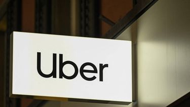 This photograph shows the logo of Uber during the World Economic Forum (WEF) annual meeting in Davos on January 19, 2026. The World Economic Forum takes place in Davos from January 19 to January 23, 2026.
INA FASSBENDER / AFP