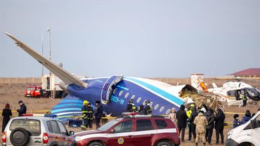 Emergency specialists work at the crash site of an Azerbaijan Airlines passenger jet near the western Kazakh city of Aktau on December 25, 2024. 
Issa Tazhenbayev / AFP