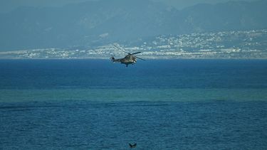 A Turkish helicopter searches the waters during a rescue operation off the coast of Kyrenia, in the self-proclaimed Turkish Republic of Northern Cyprus (TRNC), recognised only by Turkey, on August 30, 2026, after a ferry capsized. A passenger ferry capsized and sank off Northern Cyprus on August 30, killing at least seven people and leaving 23 missing, officials said, as a rescue operation was under way. The cause was not yet established. But one rescued passenger told local media a blast went off at the bow of the ferry before it rolled over.
Jewel SAMAD / AFP