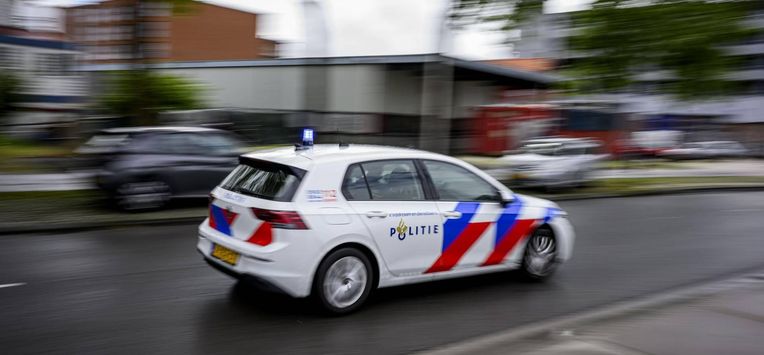 ILLUSTRATIEF - Een politieauto. ANP EMIEL MUIJDERMAN