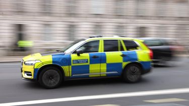 epa12682651 A police car drives in London, Britain, 26 January 2026. UK Home Secretary Shabana Mahmood is to announce plans to reform policing cutting the number of forces from its current level of 43, and shifting focus on serious and organised crime.  EPA/NEIL HALL