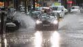A taxi drives during heavy rains in downtown Barcelona on September 29, 2026 in Barcelona, Catalonia.  
Josep LAGO / AFP