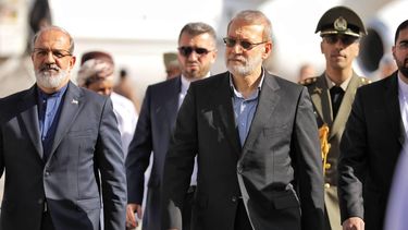 epa12722839 A handout photo made available by Iran's Supreme National Security Council office shows Secretary of the Supreme National Security Council Ali Larijani (C) arriving in Muscat, Oman, 10 February 2026. Larijani is visiting Oman following a recent round of talks between Iran and US held in the country.  EPA/IRAN'S NATIONAL SECURITY COUNCIL HANDOUT HANDOUT EDITORIAL USE ONLY/NO SALES