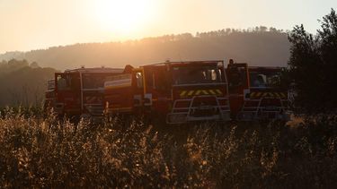 A photo shows fire engines parked at an area where firefighters gather to rest on the sidelines of working to put out wildfires in Correns, southeastern France, on August 1, 2026. The situation on the fire front remained “extremely precarious” in the evening on August 1 evening in the southeastern Var department, due to a heatwave and strong winds, whilst in the Gironde most of those who had been evacuated were able to return to their homes after ten days of battling a mega-fire that is now “contained” but not “extinguished”.
CLEMENT MAHOUDEAU / AFP