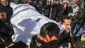 2021-03-07 15:12:11 Mourners carry the body of one of the three Palestinian fishermen, who were killed when their boat exploded off Gaza's coast in the Mediterranean Sea, during their funeral in Khan Yunis in the southern Gaza Strip, on March 7, 2021.  