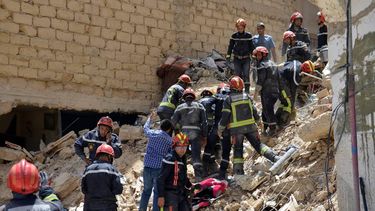 epa12981792 Rescuers search through the rubble at the site of a four-story building that collapsed overnight in the Moroccan city of Fez, Morocco, 21 May 2026. Local authorities confirmed that at least four people were killed and six others were injured in the incident.  EPA/ALAOUI MRANI