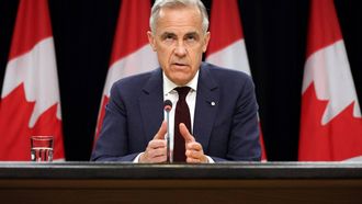 Canadian Prime Minister Mark Carney speaks during a news conference at the National Press Theatre in Ottawa, Canada on June 25, 2026. Carney is holding a wide-ranging news conference to mark last week's end to the parliamentary sitting. 
Dave Chan / AFP