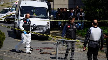 Police officials gather outside The Israeli Consulate in Istanbul on April 7, 2026, following a shootout between gunmen and police. One gunman was killed and two others were wounded in a shootout with police outside the Israeli consulate in Istanbul, the local governor said, adding two officers were lightly wounded
Yasin AKGUL / AFP