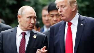 Donald Trump en Vladimir Poetin praten over Syrië. / AFP