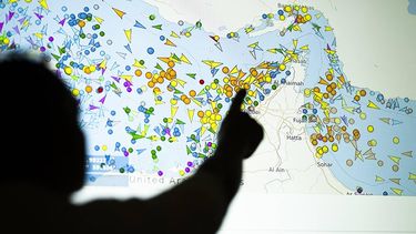 A photo illustration taken in Nicosia on May 4, 2026, shows a person in front of a large screen displaying vessel movements in the Strait of Hormuz on a ship-tracking website. Iran's navy fired 'warning shots' at US warships in the Strait of Hormuz on May 4, state media said, after the American military sent cruisers into the Gulf as part of a plan to help trapped commercial vessels leave. Earlier, US President Donald Trump had announced a plan to guide ships from neutral countries out of the Gulf, saying it was a humanitarian effort to help their stranded crews.
AFP