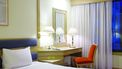 Een foto van een op het oog schone hotelkamer