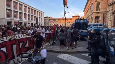 epa13123620 Protesters face off with police officers during a demonstration calling for justice for Abderrahim Fakir, a Moroccan man who died while being restrained by police during an arrest, in Bologna, Italy, 20 July 2026.  EPA/MAX CAVALLARI