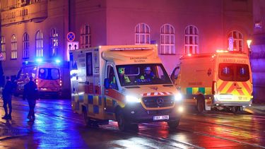 epa11040003 Emergency service vehicles at the scene of a shooting at Charles University in central Prague, 21 December 2023. According to Czech Police several people have been killed and 