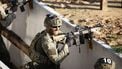 HARSKAMP - Militairen in actie tijdens een demonstratie op de vernieuwde gevechtsbaan op het Infanterie Schietkamp (ISK). De trainingslocatie is grondig gemoderniseerd. ANP JEROEN JUMELET