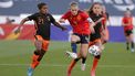 epa09125311 Spain's defender Irene Paredes (C) vies for the ball with Netherland's striker Lineth Beerensteyn (L) during the international friendly women's soccer match between Spain and the Netherlands held at Antonio Lorenzo Cuevas stadium, in Marbella, southern Spain, 09 April 2021.  EPA/Carlos Diaz