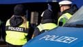 The lettering 'Polizei' (police) is seen on the bonnet of a police vehicle as German police officers control cars at a border control station between Oberaudorf (Germany) and Niederndorf (Austria), southern Germany on February 6, 2025. 
Michaela STACHE / AFP