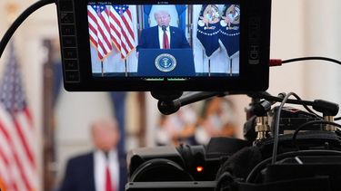 A camera screen shows US President Donald Trump speak during a televised address on the conflict in the Middle East from the Cross Hall of the White House in Washington, DC on April 1, 2026. 
Alex Brandon / POOL / AFP
