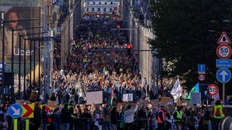 epa13296631 Thousands of people take part in the annual National Climate March, organized by the Climate Coalition, in Brussels, Belgium, 11 October 2026. This year's march calls on leaders to move away from fossil fuels, while participating group Code Red campaigns against nuclear energy, what it describes as 'technofascism,' and data centers.  EPA/OLIVIER MATTHYS